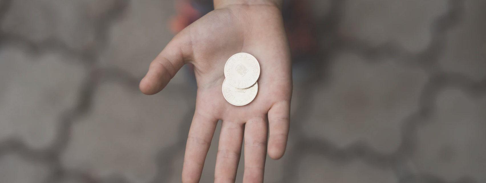 kid planning finances with coin